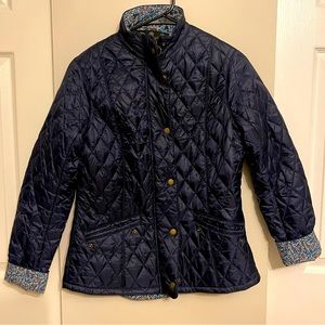 Barbour women’s navy jacket with floral accent lining, size 10.